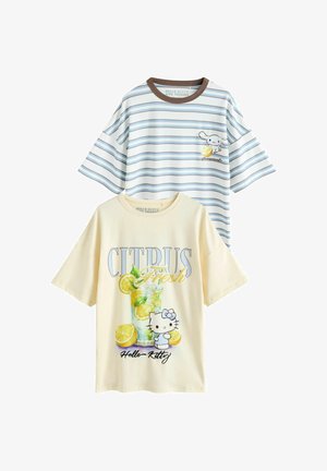 Zwei kurzärmelige Hemden: eines gestreift mit einem kleinen Hasen, der eine Zitrone hält, das andere cremefarben mit Hello Kitty, Zitronen und dem Text "CITRUS Fresh".