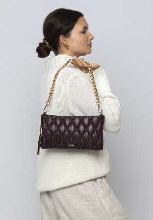 Quilted burgundy handbag with a gold chain strap, featuring a smooth leather texture and a gold logo detail.