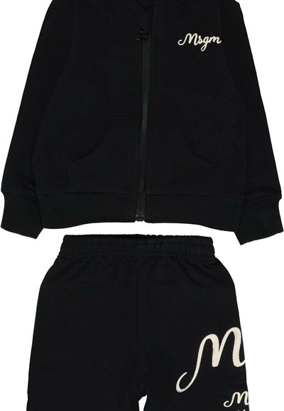 Zwarte rits hoodie en set met elastische taillebroek met wit "Msgm" logo op de borst en het broekbeen.