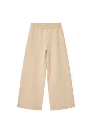 Pantaloni beige a gamba larga in tessuto morbido, con vita elastica e logo "AS" in rilievo sul lato.