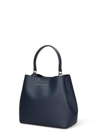 Marineblauwe Michael Kors totebag met een gladde textuur, gestructureerde vorm, twee handvatten en een logo-accent aan de voorkant.