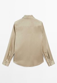 Beige long-sleeve satin shirt with a classic collar and buttoned cuffs, shown from the back on a plain white background.