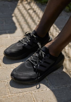 adidas Performance ULTRABOOST LIGHT - Road running shoes - core black