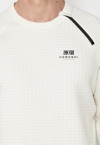 Koroshi Sportska majica - crudo   off white