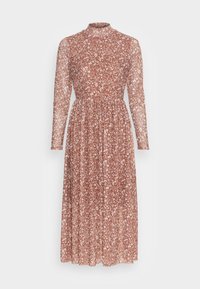 Lång, brun blommig klänning med hög hals och långa ärmar. Har ett indraget midja och en flödande kjol. Tillverkad av ett lätt, genomskinligt tyg.