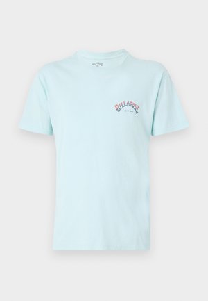 Light blue cotton t-shirt featuring a round neck, short sleeves, and a small embroidered logo in red and blue on the left chest.