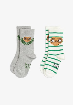 Graue Socken mit E.T. und Blättern Design; weiße Socken mit grünen Streifen und E.T. Gesicht. Weiche Baumwollmischung, Knöchellänge.