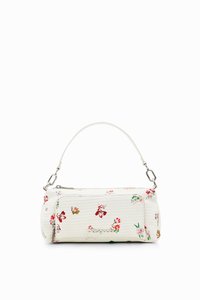 Borsa bianca con motivo floreale realizzata in materiale testurizzato, dotata di una zip superiore e di una corta tracolla con finiture in tonalità argento.