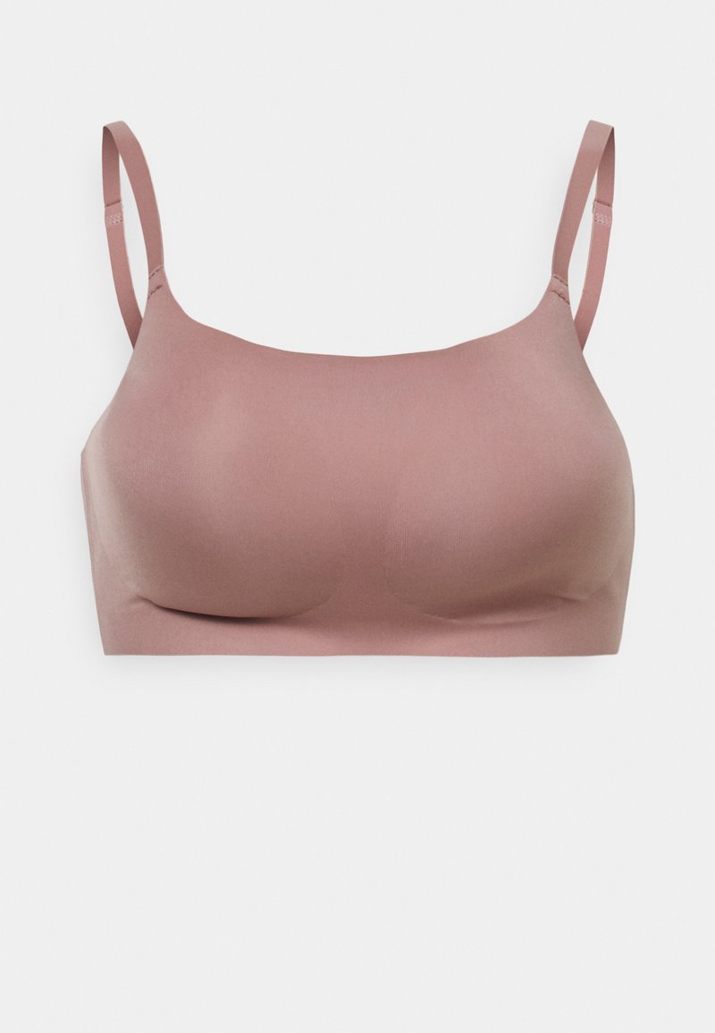 Mauve, bezšavni bralet s tankim trakama. Mekani, glatki materijal s suptilnim sjajem. Okrugli košići i čist, minimalistički dizajn.