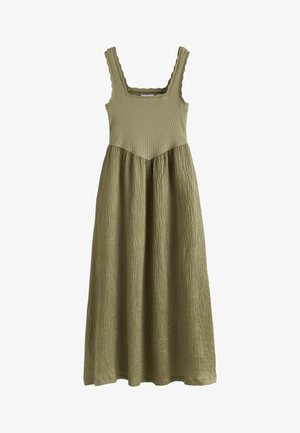 Nátelné olivovo zelené šaty s rebrovaným priliehavým živôtikom, štvorcovým výstrihom, vlnitými ramienkami a textúrovanou prúdiacou sukňou siahajúcou do polovice lýtka.