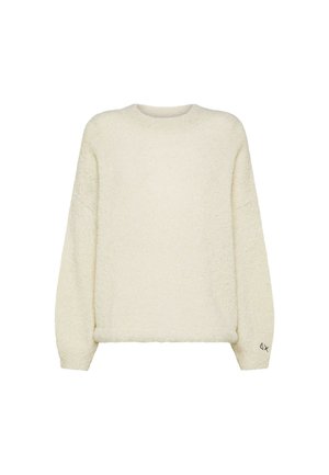 Pullover in pelliccia morbida con maniche lunghe, scollatura rotonda e vestibilità rilassata. Presenta un piccolo logo sulla manica sinistra.