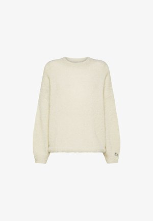 Pullover in pelliccia morbida con maniche lunghe, scollatura rotonda e vestibilità rilassata. Presenta un piccolo logo sulla manica sinistra.