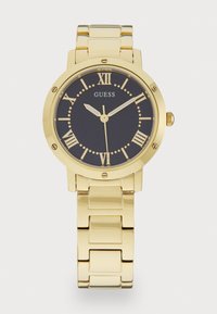 Montre-bracelet en or avec un boîtier rond, un cadran noir, des index en chiffres romains et un bracelet en maillons métalliques. Présente des accents en or simples et une couronne.