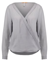 Blusa grigia a maniche lunghe con scollo a V e design avvolgente; realizzata in tessuto testurizzato con finitura liscia e orlo leggermente curvo.