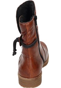 Bottine en cuir marron avec fermeture éclair, doublure douce, lacets tressés et semelle texturée. Le design est robuste et décontracté.