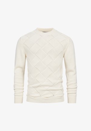 Maglione lavorato a maglia color crema con motivo a rombi, polsini e orlo a costine. Realizzato in morbido materiale con scollo rotondo.