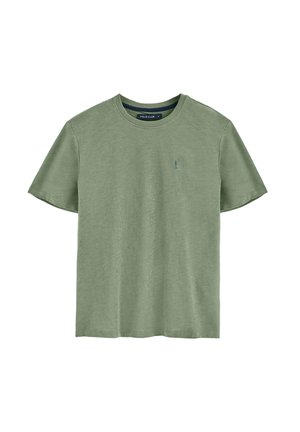 T-shirt di colore verde chiaro a maniche corte realizzato in un tessuto morbido. Collo a girocollo con un piccolo logo sul lato sinistro del petto. Design semplice e vestibilità rilassata.