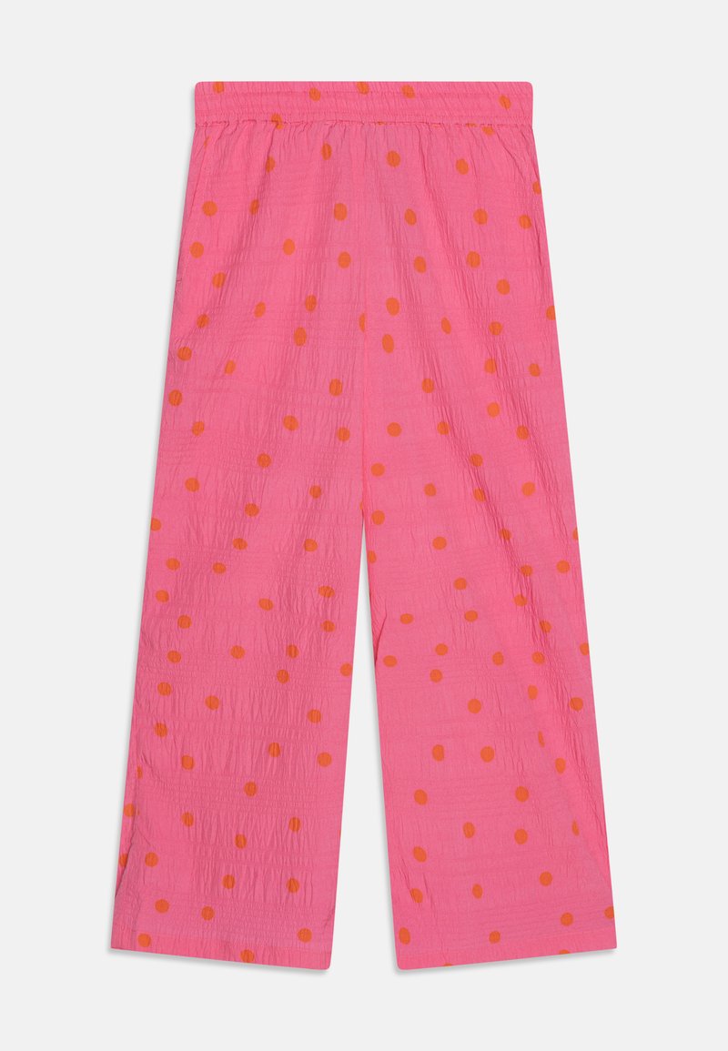 Rosa vide ben bukser laget av lett stoff, med elastisk liv og oransje prikkete mønster gjennom hele.