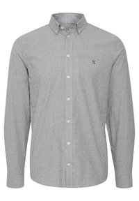 Camicia a righe blu e bianca. Presenta un colletto tradizionale, maniche lunghe e un piccolo logo sul petto. Realizzata in tessuto di cotone.