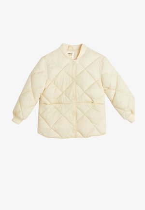 Quilted cream jacket with snap button closure, ribbed collar, and cuffs. Features diamond pattern and side pockets. Soft, lightweight fabric.
