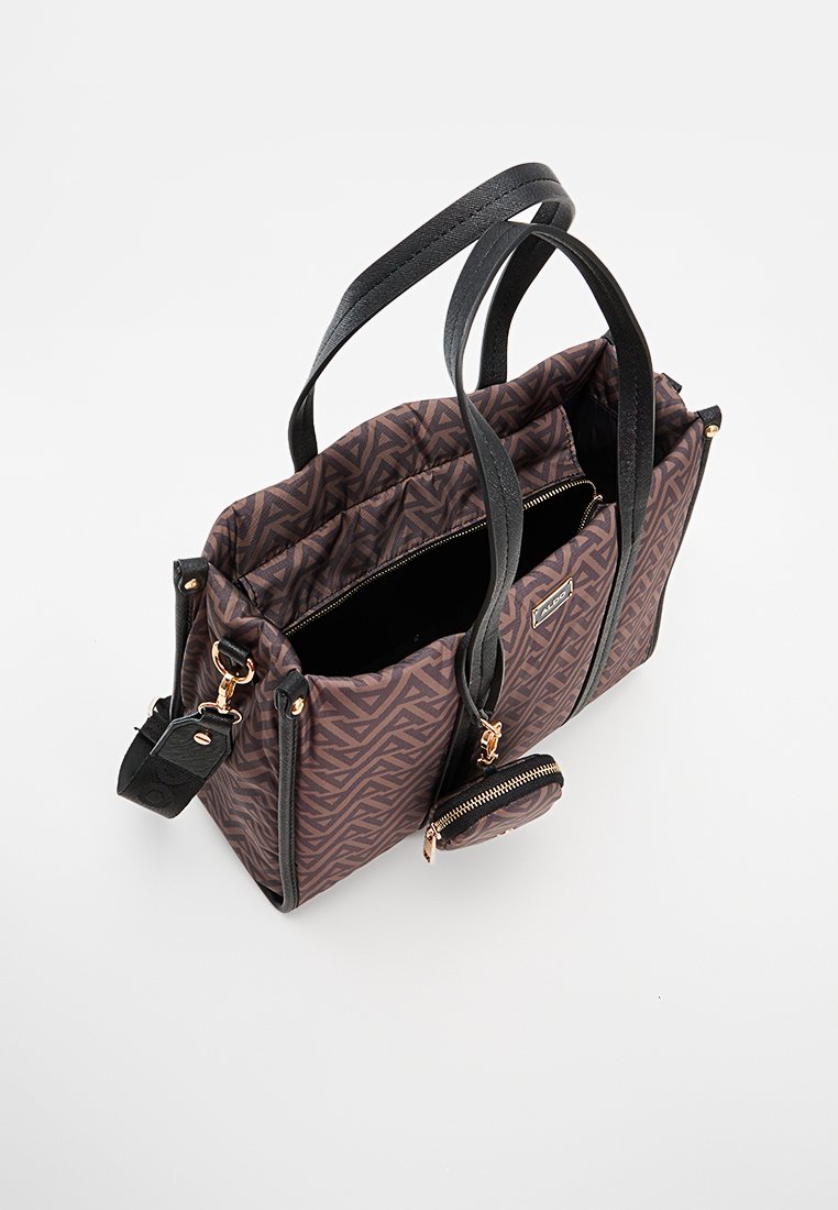 Sac fourre-tout à motif brun avec des poignées en simili cuir noir, comportant une fermeture éclair et une pochette à pièces détachable avec des accents en or.