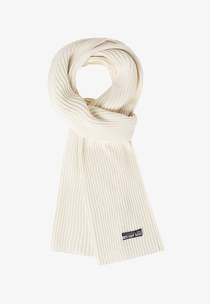 Ribbed cream scarf made of soft fabric with a smooth texture. Features a logo tag near the end, showcasing simple design and color.