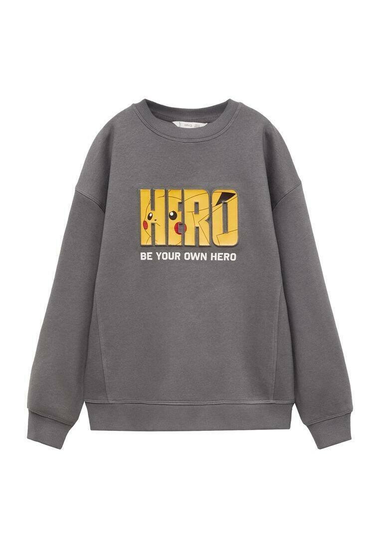 Grijze sweatshirt met een opvallende gele "HERO" grafiek met een cartoonfiguur en de tekst "WEES JE EIGEN HELD." Zacht materiaal en een ontspannen pasvorm.