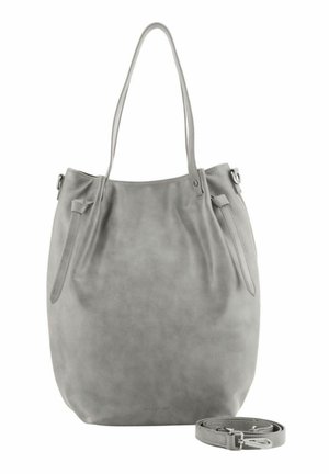Grand sac à main gris doux avec deux poignées de shoulder et une longue bandoulière amovible enroulée à côté sur un fond blanc.
