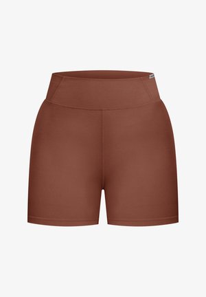 Pantalones cortos ajustados de talle alto en un color óxido sólido. Hechos de un material suave y elástico con costuras planas para mayor comodidad. Sin características o patrones prominentes.