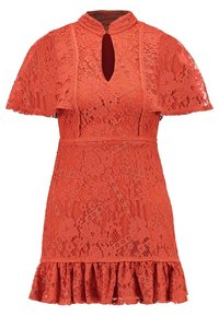 Red lace dress with a high neckline and keyhole cutout. Short sleeves and a ruffled hem enhance the floral pattern and texture.