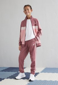 adidas Performance TIBERIO UNISEX jasnoróżowy