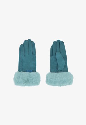 Guanti in suede teal con un morbido polsino in pelliccia sintetica di un blu chiaro. Cuciture dettagliate sulle dita e un logo a patch nella zona del polso.