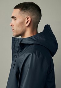 Next RUBBERISED HOODED-REGULAR FIT - Jachetă impermeabilă - navy blue