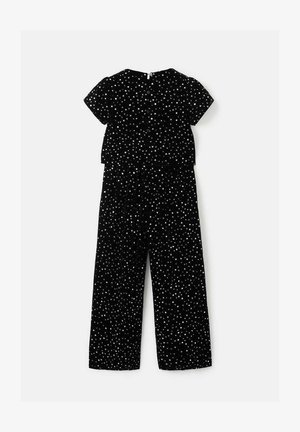 Svart jumpsuit med korta ärmar, med ett spritt mönster av vita prickar. Mjuk tyg, lös passform och elastisk midja för komfort.