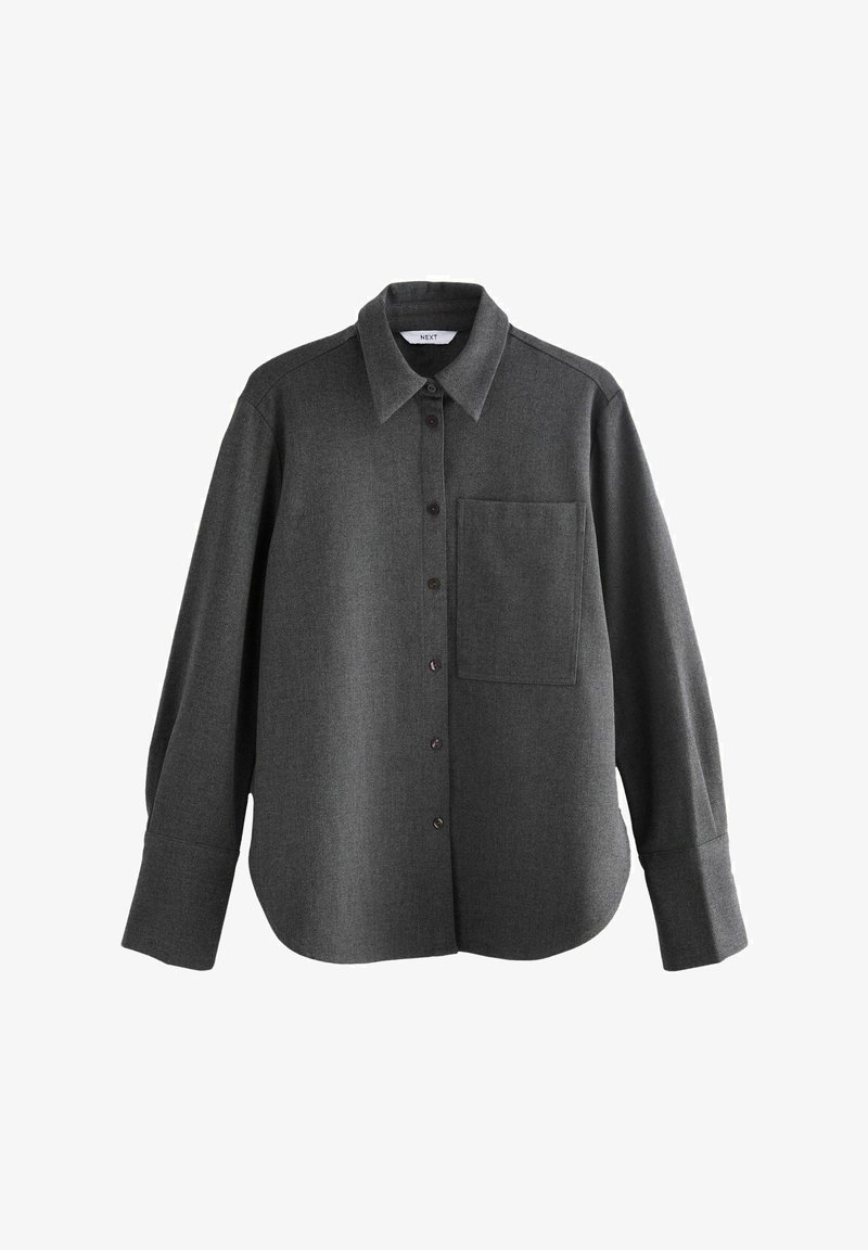 Mørkegrå langærmet skjorte i blød uldblanding, med knaplukning foran, spidse kraver og en brystlomme. Glat tekstur, afslappet pasform.