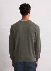 Olive green knitted sweater with a round neckline, long sleeves, textured pattern, and ribbed cuffs and hem, shown from the back.
