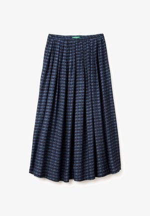Maxi skirt in navy featuring a textured circular pattern. Made of soft fabric with pleats for movement and an elastic waistband.