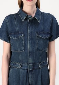 Good American FIT FOR SUCCESS PLEATED WIDE LEG - Ολόσωμη φόρμα - indigo