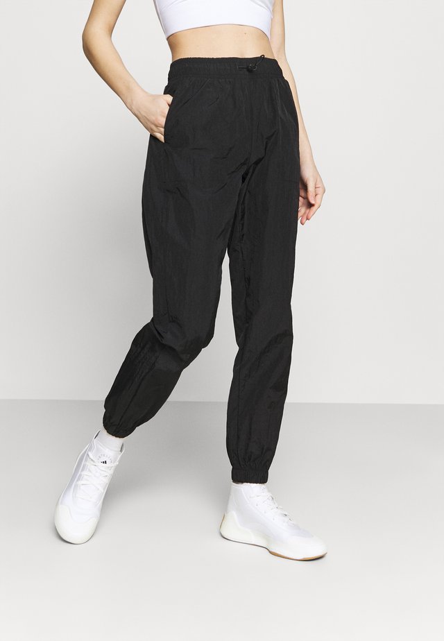 MALILA TRACK PANT - Verryttelyhousut - black