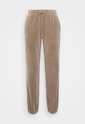 Pantaloni della tuta marrone chiaro realizzati in morbido velluto, con cintura elasticizzata e lacci, tasche laterali e polsini a strettoia.