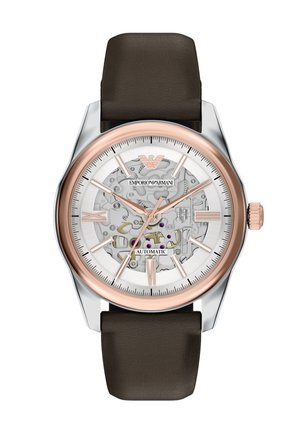 Men's automatic wristwatch with brown leather strap, rose gold bezel, skeleton dial showing mechanical gears, and rose gold hour markers and hands.