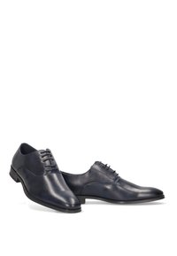 Zapatos de vestir de cuero azul marino con un acabado suave, puntera afilada, diseño de cordones de seis ojales y un perfil delgado. Suela de goma para tracción.