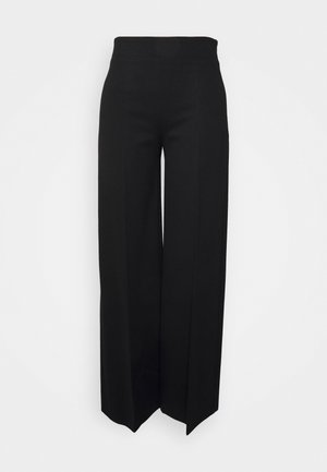 Pantalon noir à jambes larges et taille haute, coupe droite avec devant épuré sans poches ni boutons visibles.