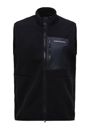 Fekete polár mellény teljes elülső cipzárral és cipzáras mellkaszsebbel, melyen jobb oldalt a „Peak Performance” logó látható.