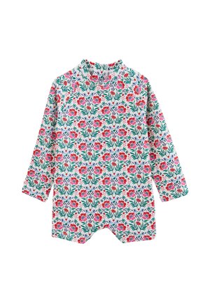 Grenouillère bébé à manches longues avec motif floral rose et rouge et feuilles vertes sur fond blanc.