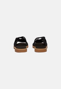 Timberland SLIDE  - Mules - black knit