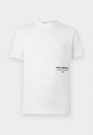 T-shirt bianco a maniche corte con collo rotondo, con piccola scritta nera "KARL LAGERFELD 21 RUE ST-GUILLAUME PARIS" sul lato sinistro del petto.