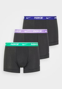 Boxer neri con vita elastica in verde, viola e blu, con il logo Nike in bianco. Tessuto morbido e stretch, superficie liscia.