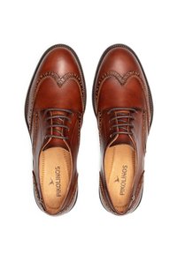 Chaussures en cuir marron avec un design à bout fleuri, des détails en brogue et un bout arrondi. Comprend un système de laçage et une texture lisse.