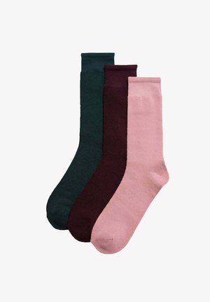 Tres pares de calcetines en verde oscuro, burdeos profundo y rosa claro. Cada calcetín tiene una textura suave y un diseño de longitud hasta la mitad de la pantorrilla.